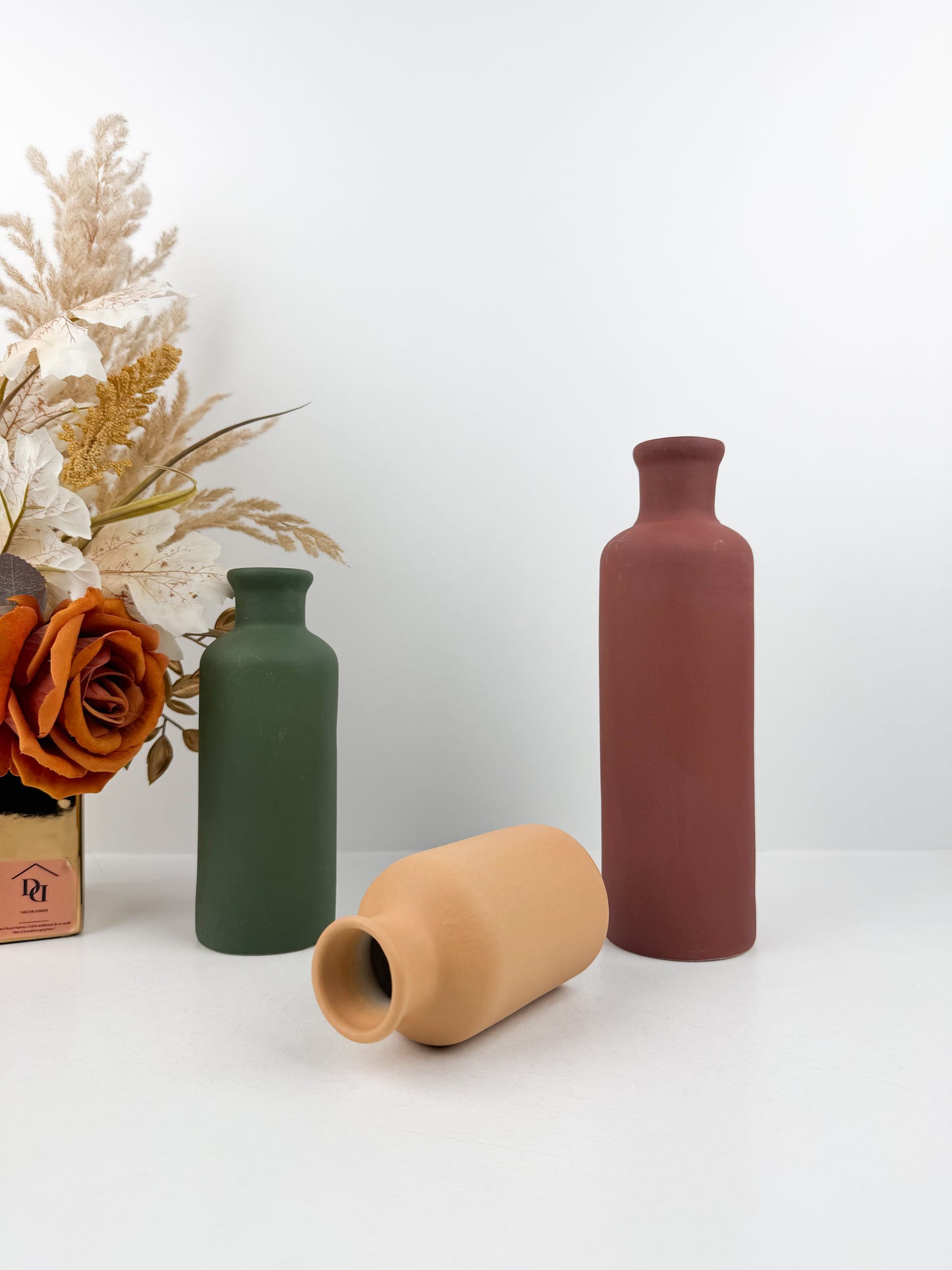 Trio de vases aux finitions mates et coloris variés