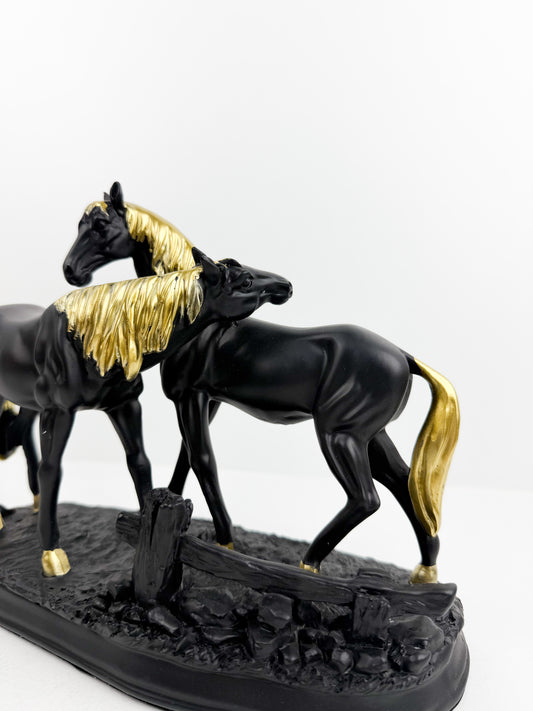 Sculpture élégante représentant un duo de chevaux noir