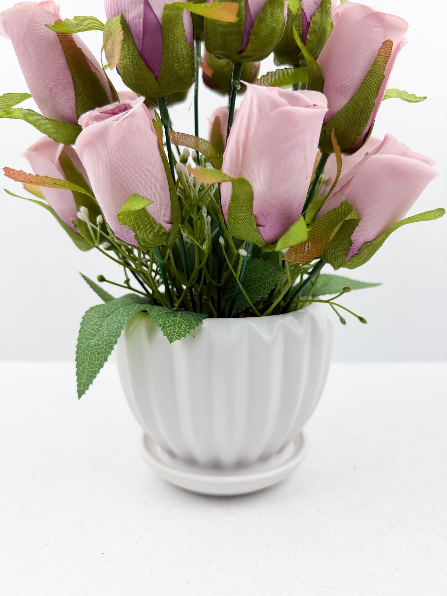 Fleurs artificielles roses d'une élégance intemporelle