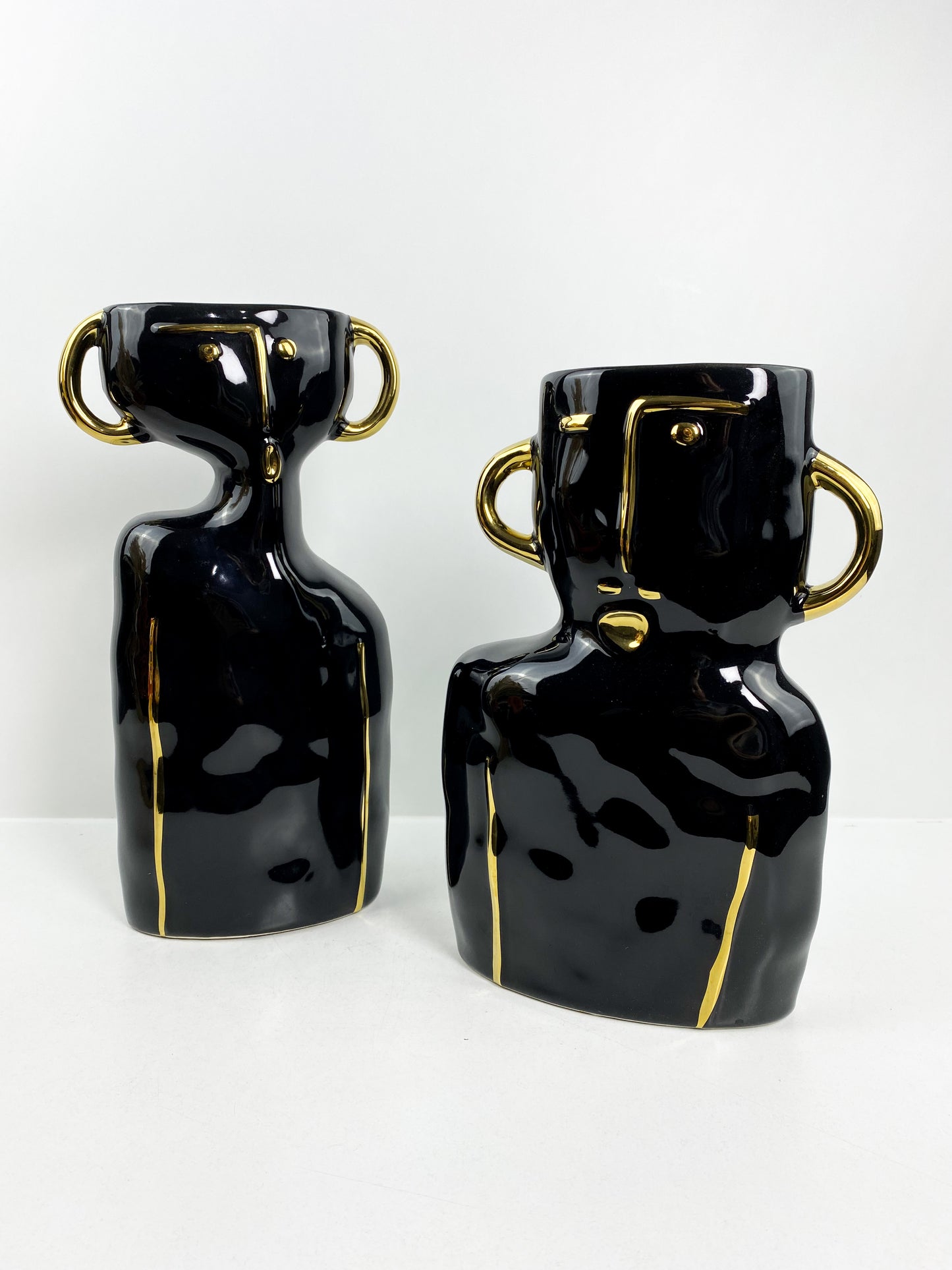 Duo vase noir visage détailles dorée