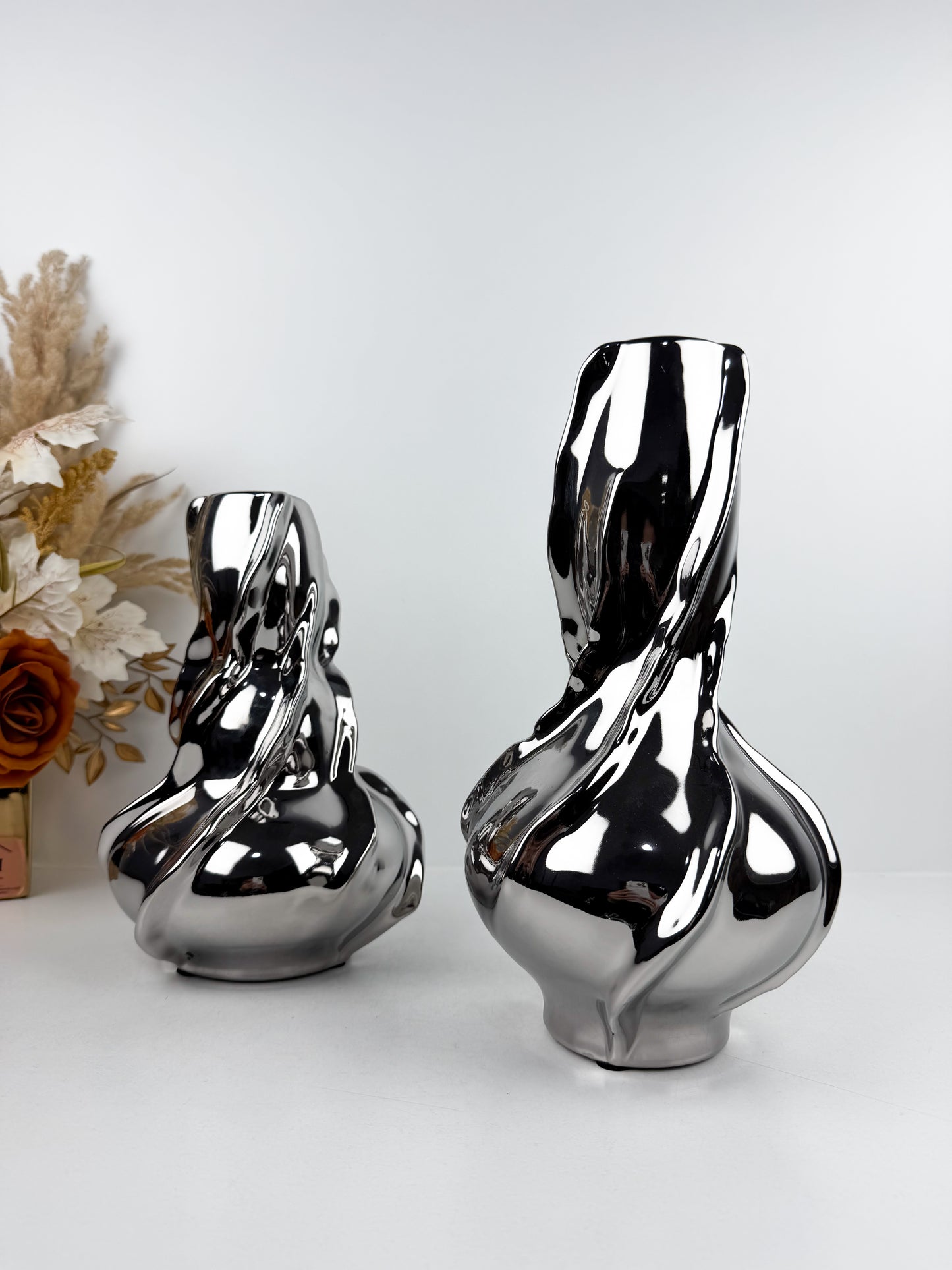 Duo vase en céramique aux  finitions argentées brillantes