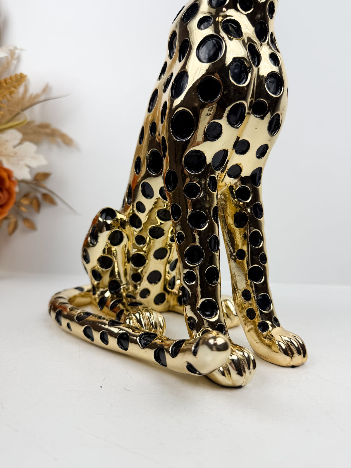 Magnifique figurine représentant un léopard assis