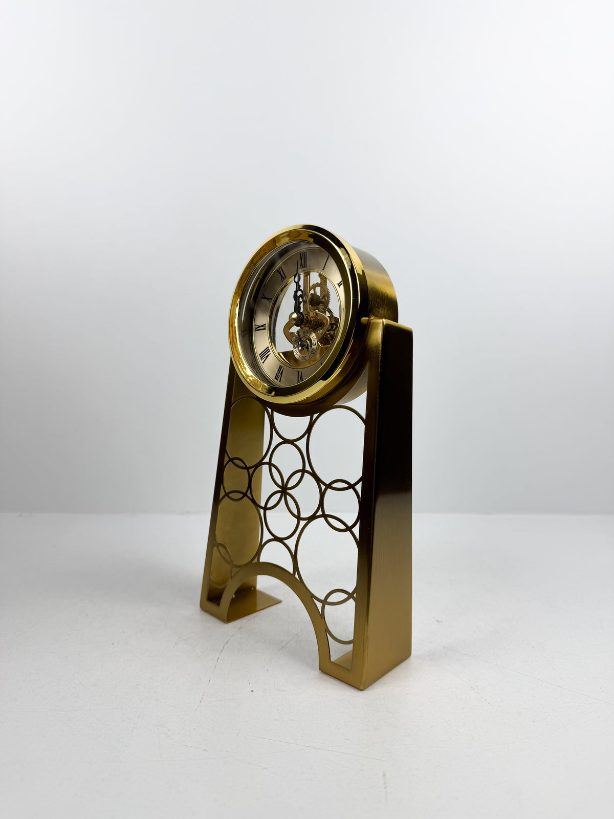 Horloge de table mécanique en métal doré