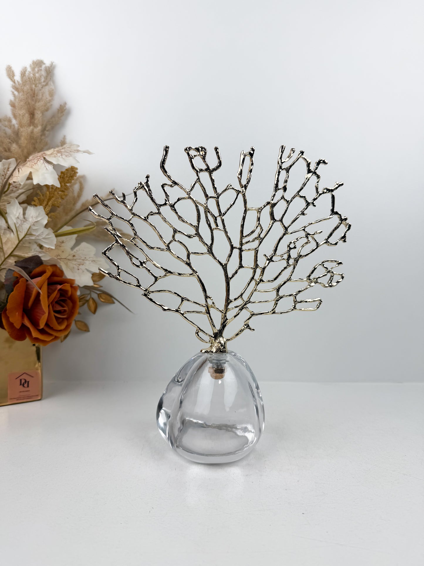 Sculpture décorative en forme d'arbre, montée sur un socle en cristal