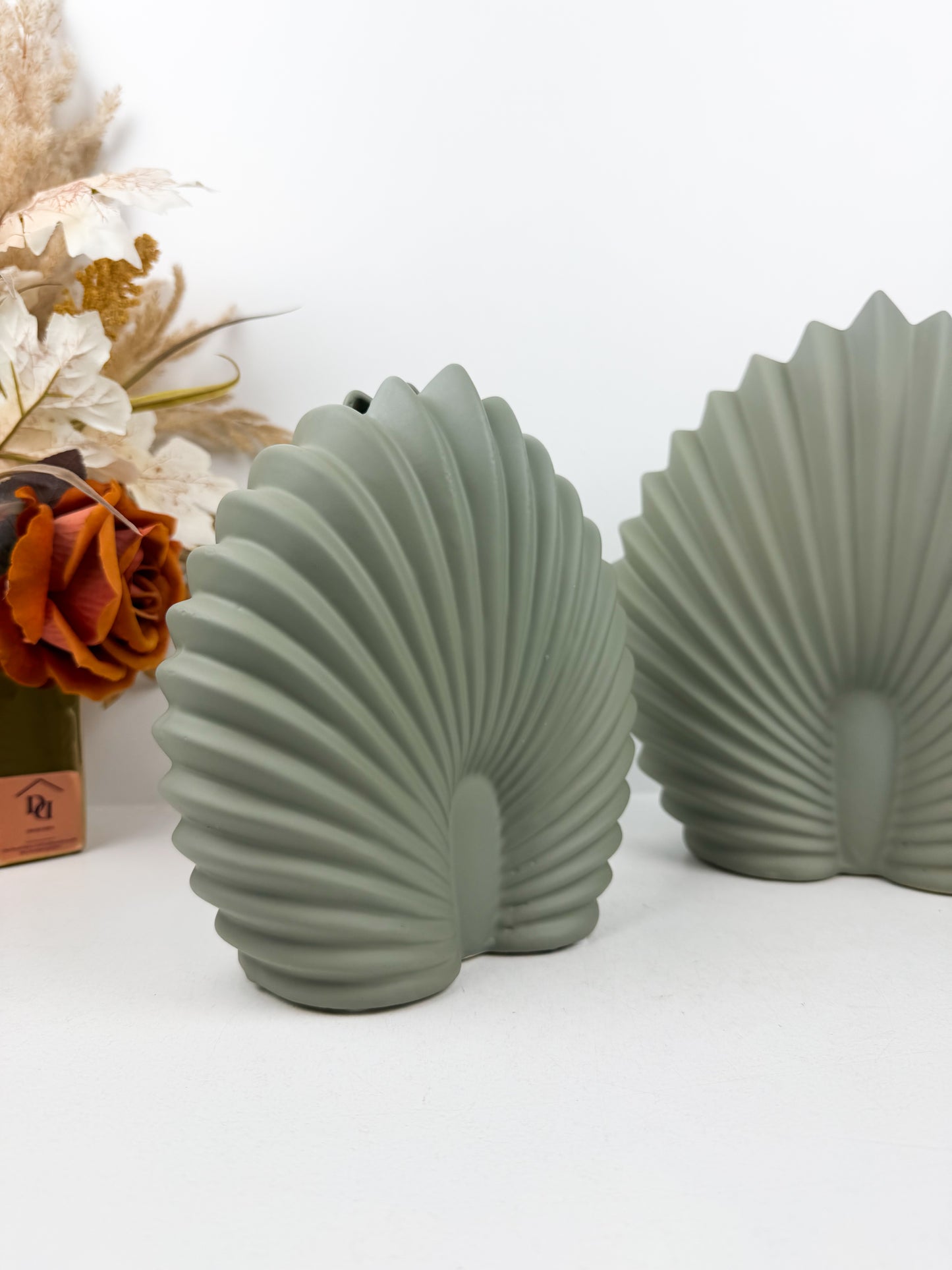 Vase décoratif céramique en forme de coquillage en vert