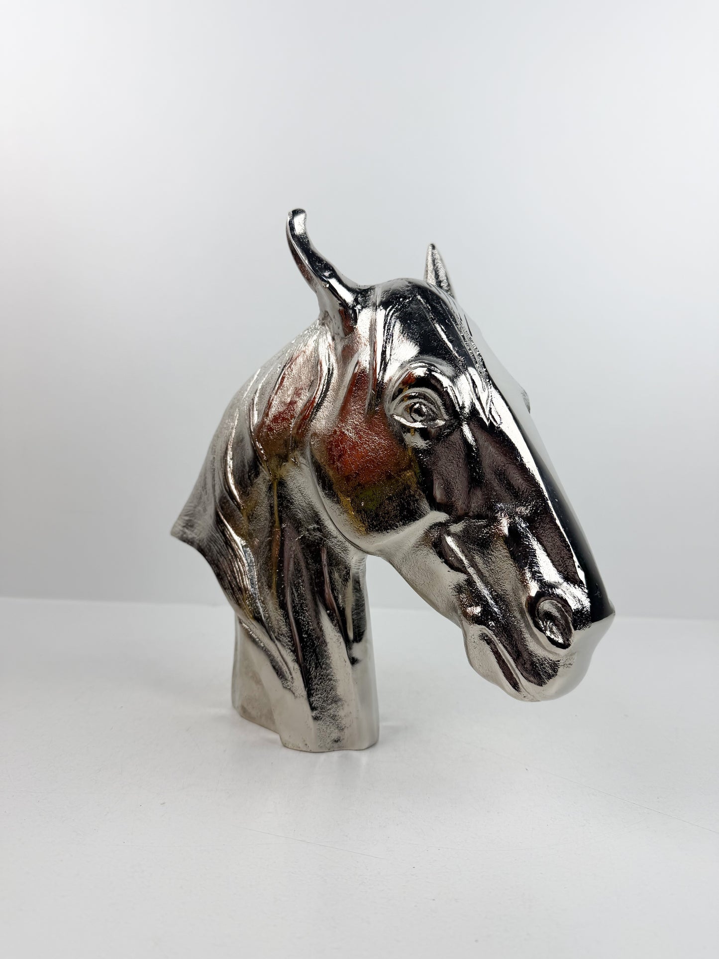 Sculpture de tête de cheval en métal argenté