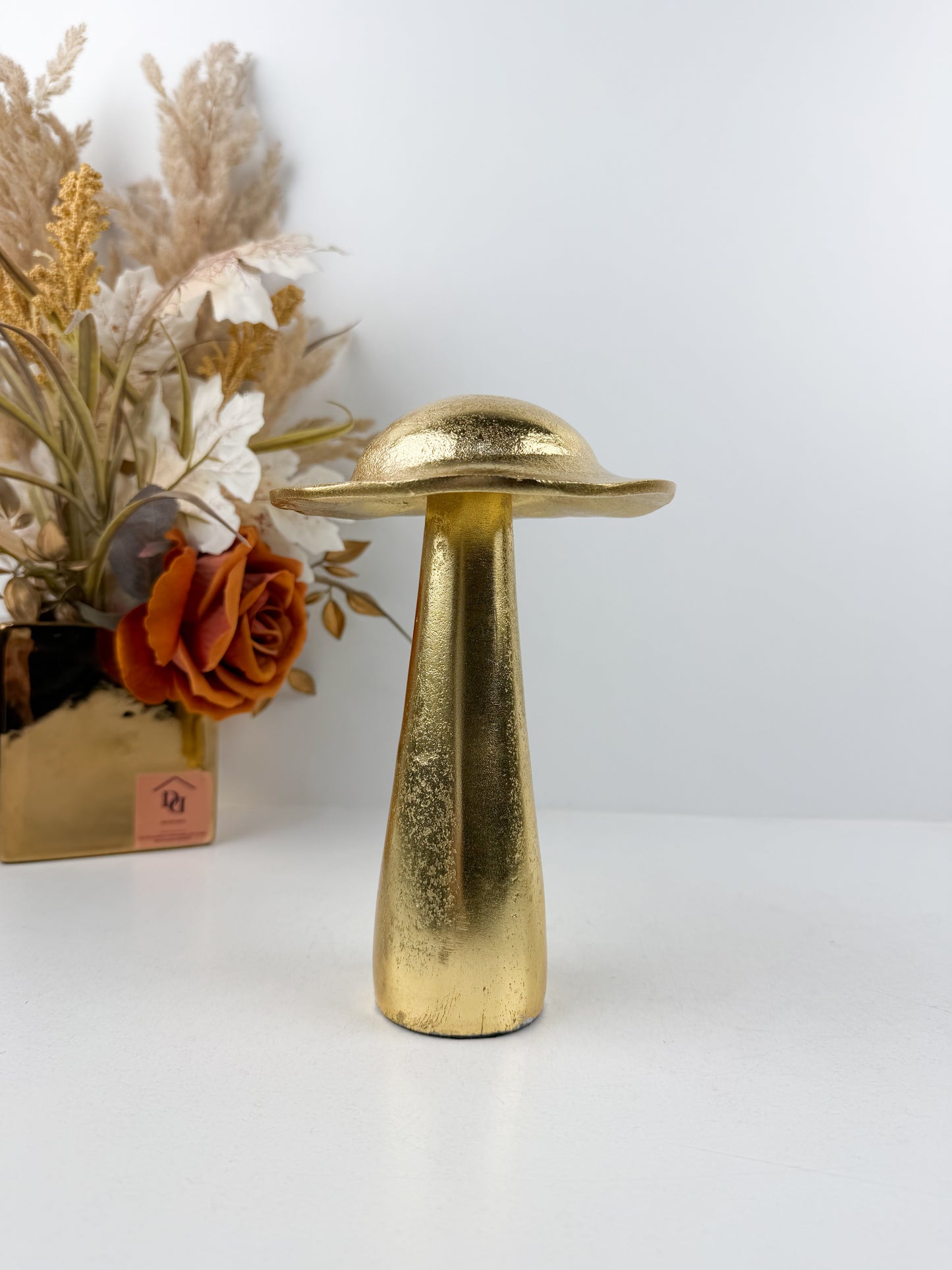 Sculpture décorative en forme de champignon doré en métal