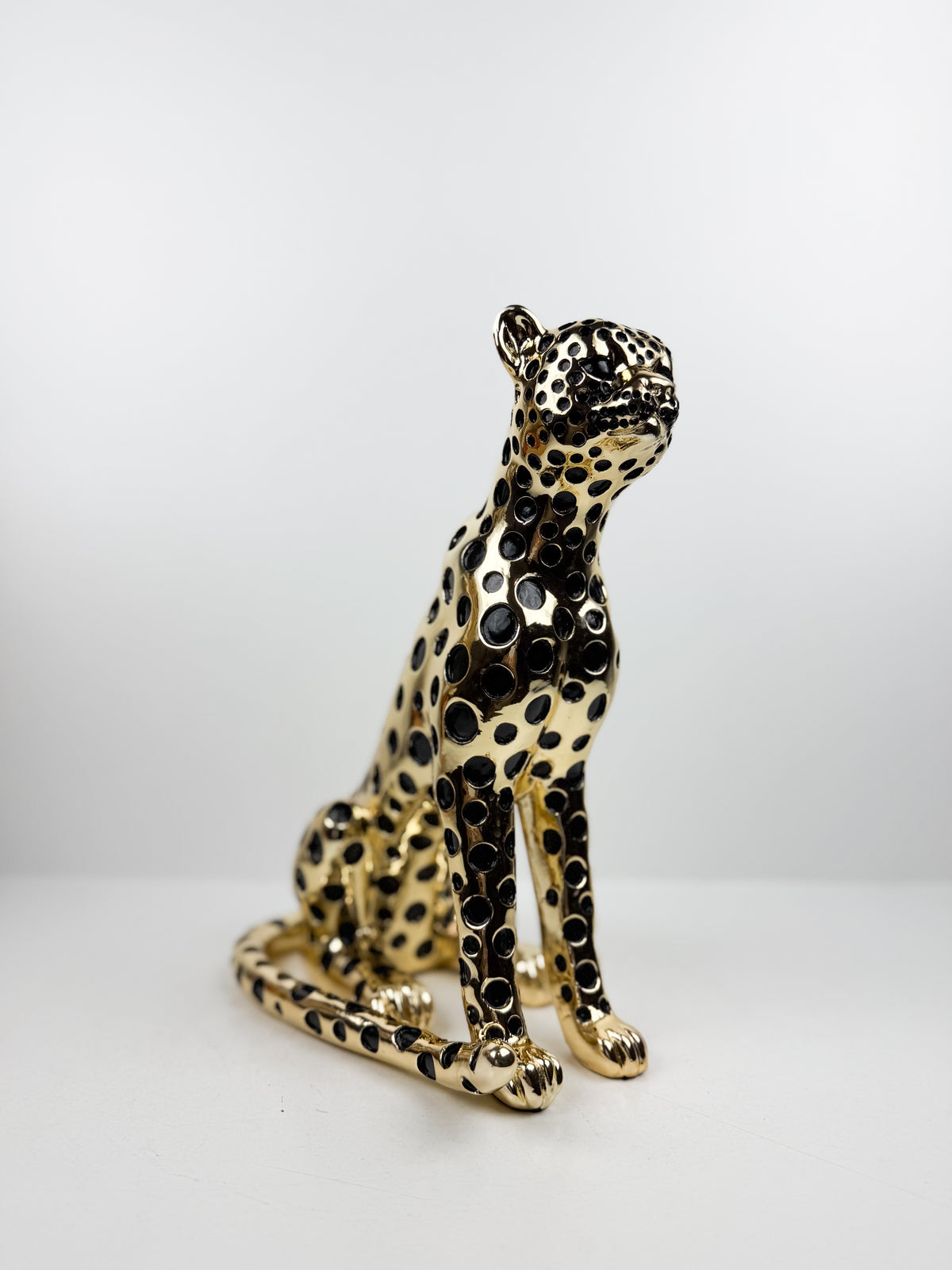 Magnifique figurine représentant un léopard assis