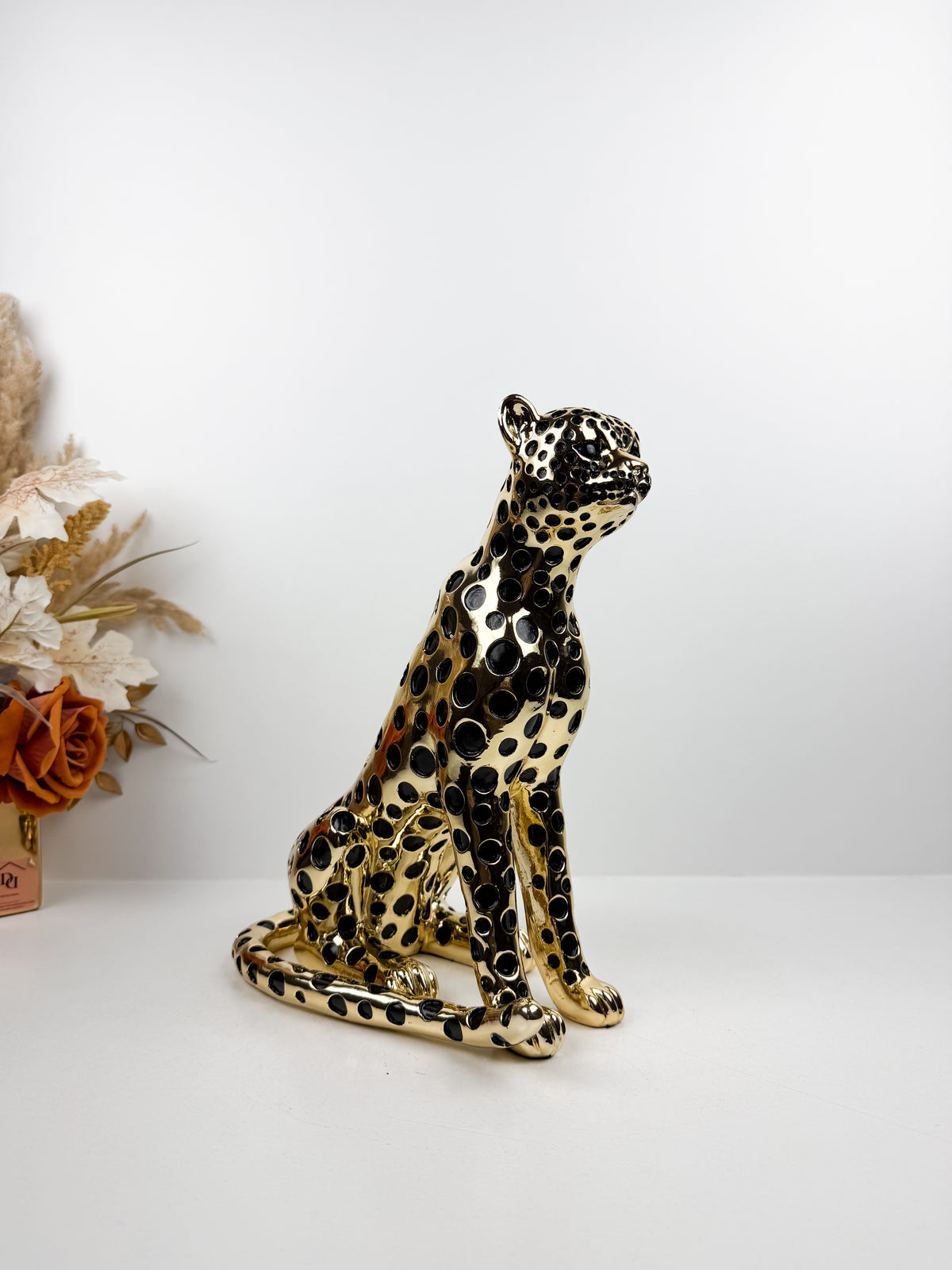 Magnifique figurine représentant un léopard assis