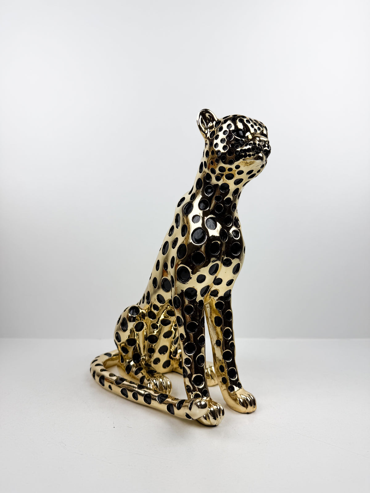 Magnifique figurine représentant un léopard assis