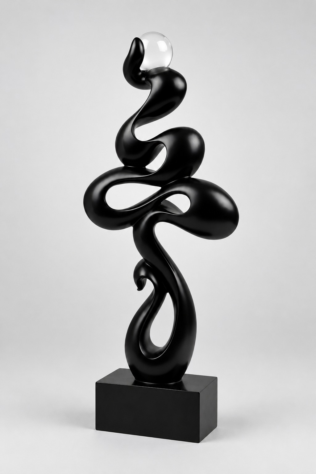Sculpture décorative en résine  noir mat abstraite.