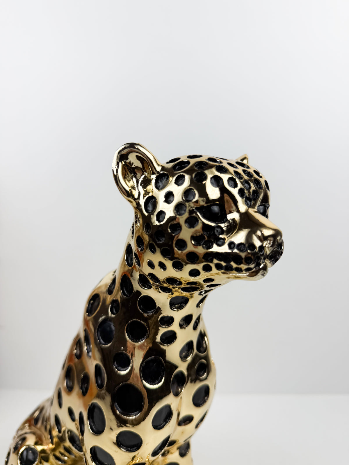 Magnifique figurine représentant un léopard assis