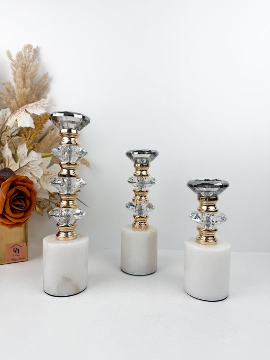 Ensemble de trois bougeoirs décoratifs alliant élégance et sophistication en cristal