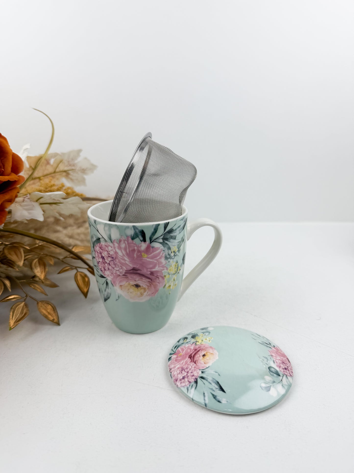 Mug café en céramique élégant orné d'un motif floral sophistiqué