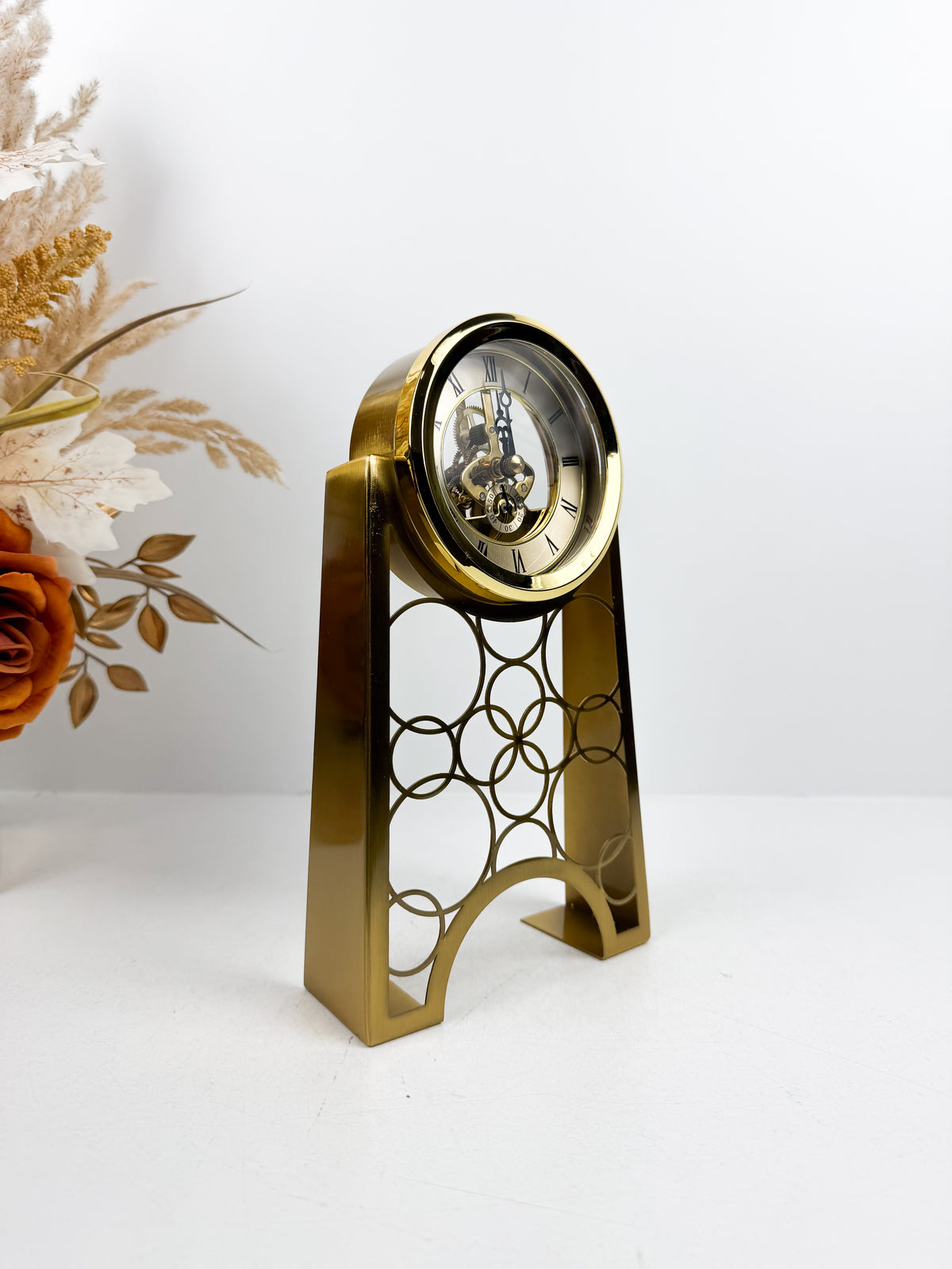 Horloge de table mécanique en métal doré