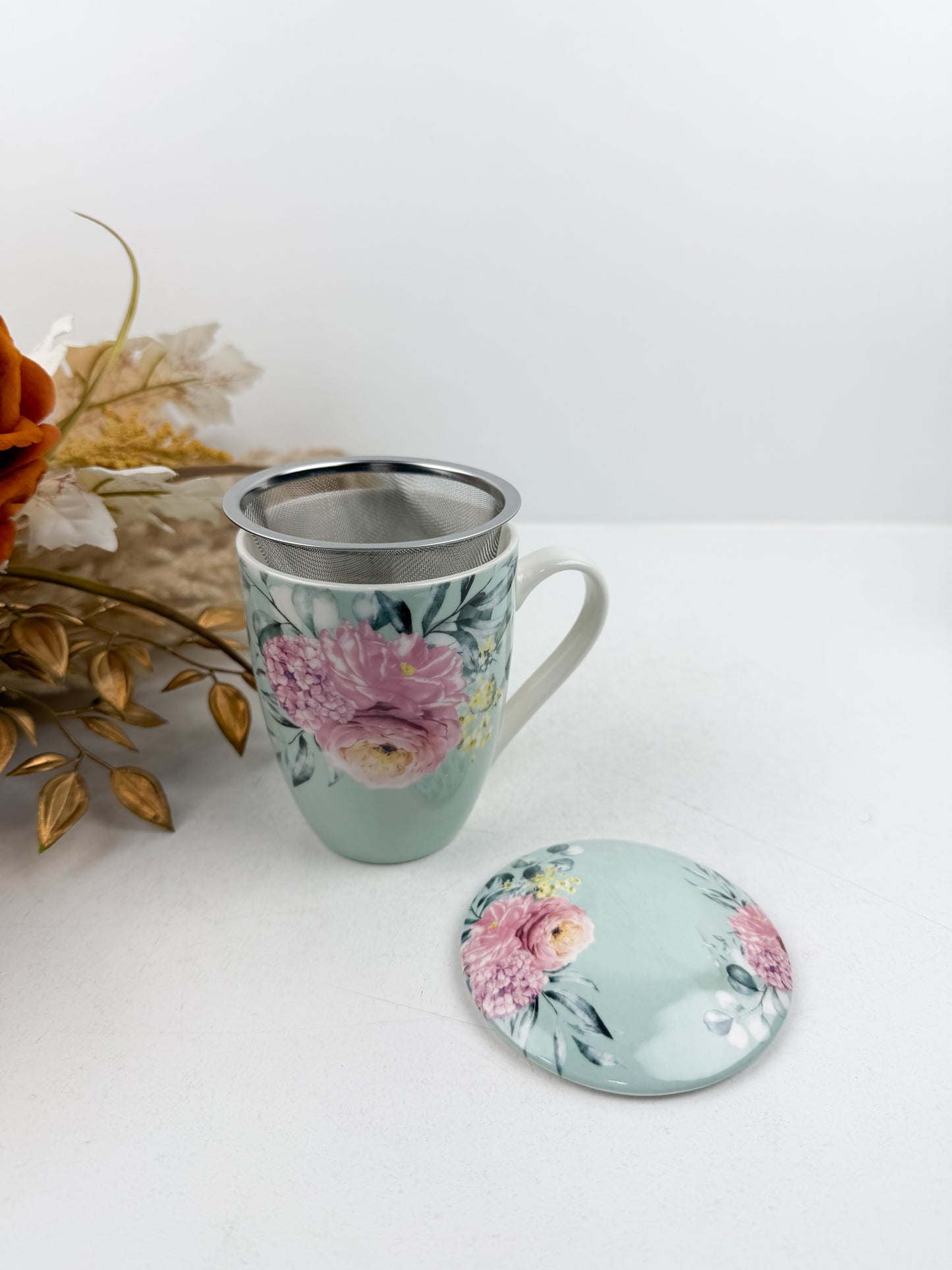 Mug café en céramique élégant orné d'un motif floral sophistiqué