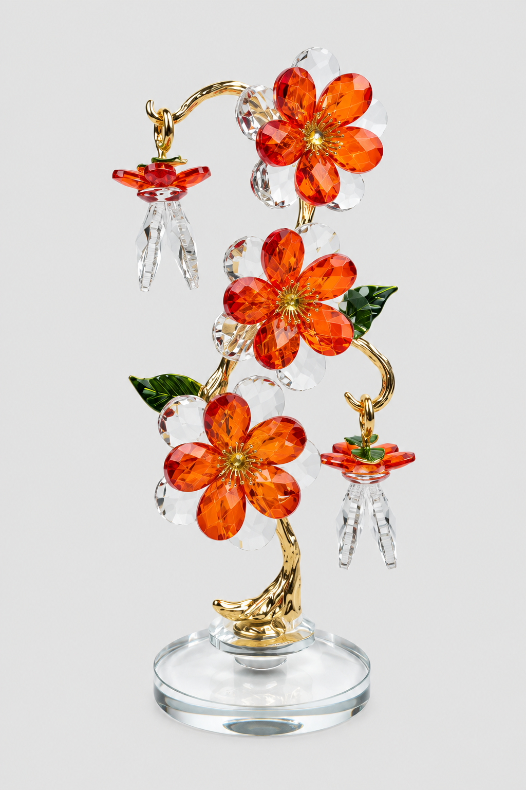 Fleur décorative en cristal en finition dorée et orange élégante.