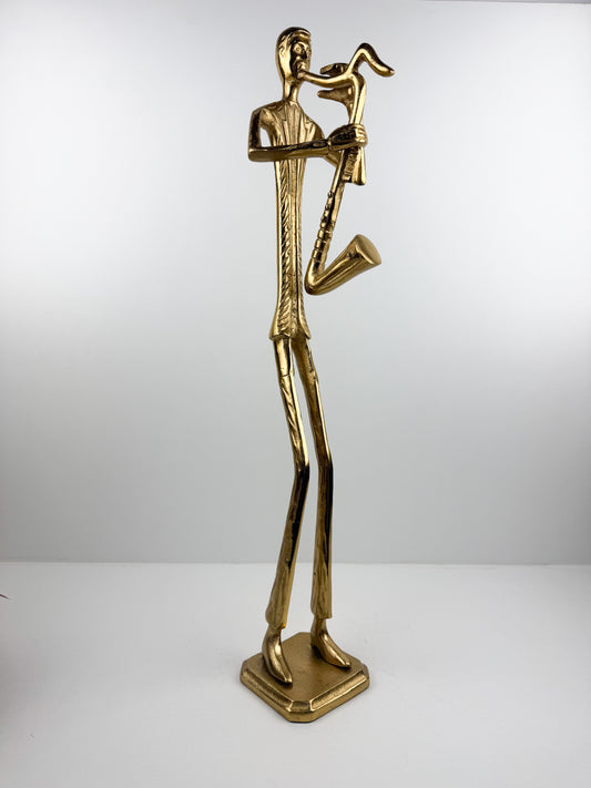 Figurine capture l'essence du jazz avec une interprétation artistique abstraite en métal