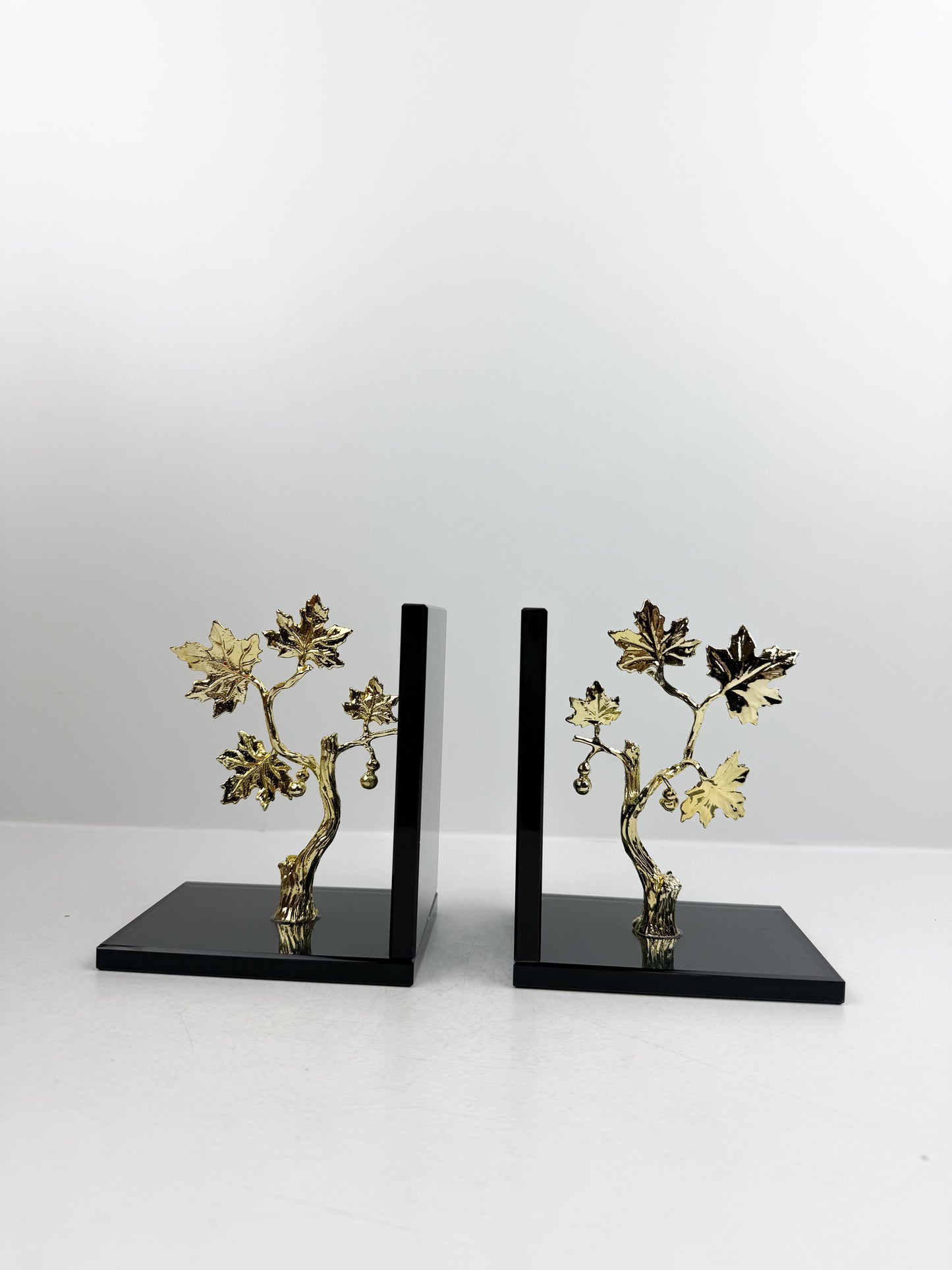 Serre-livre orné d'un motif arbre doré