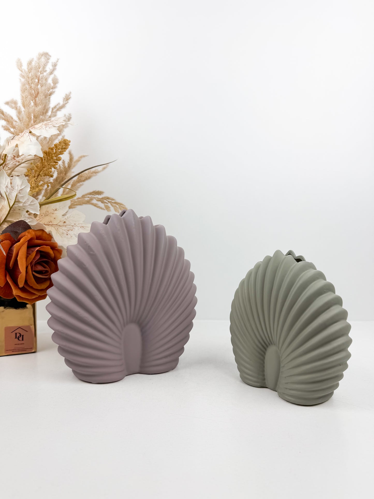 Duo de vases en forme de coquillage
