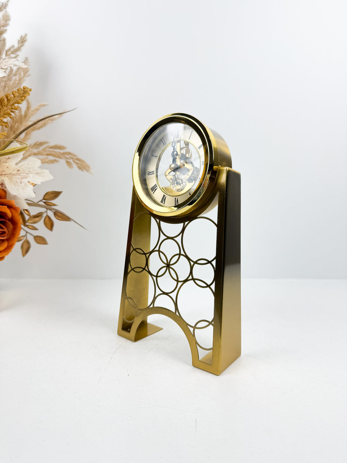 Horloge de table mécanique en métal doré