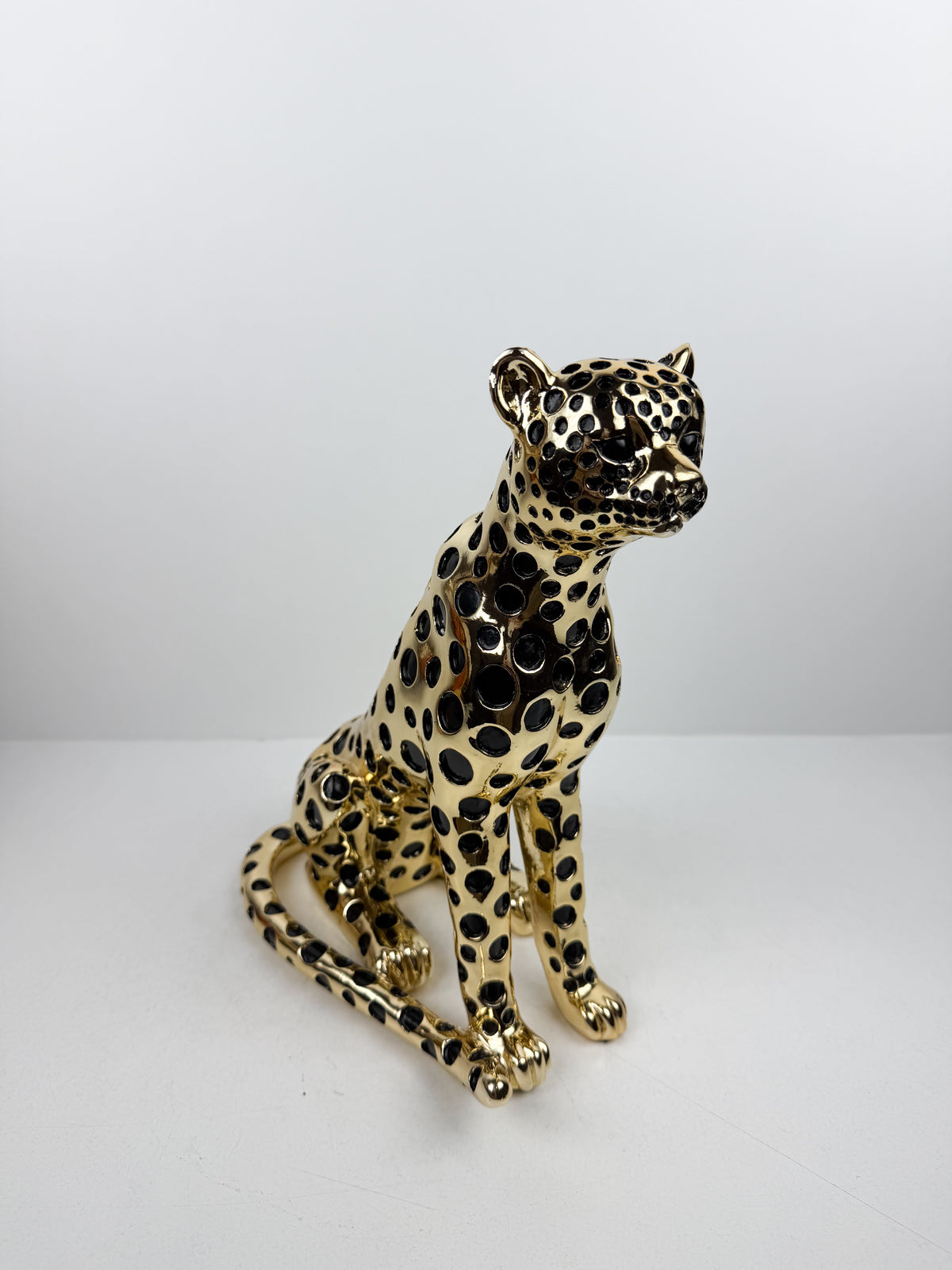 Magnifique figurine représentant un léopard assis