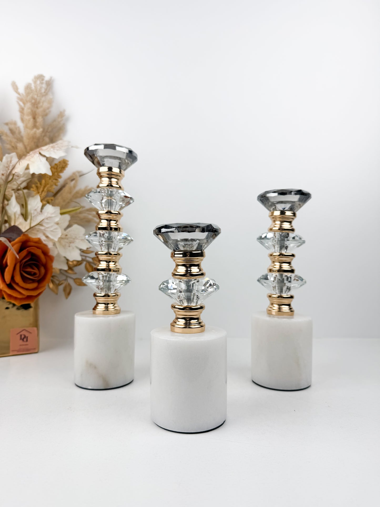 Ensemble de trois bougeoirs décoratifs alliant élégance et sophistication en cristal