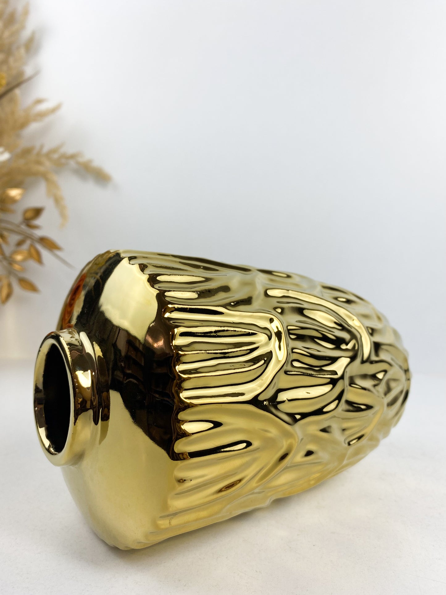 Vase en céramique doré
