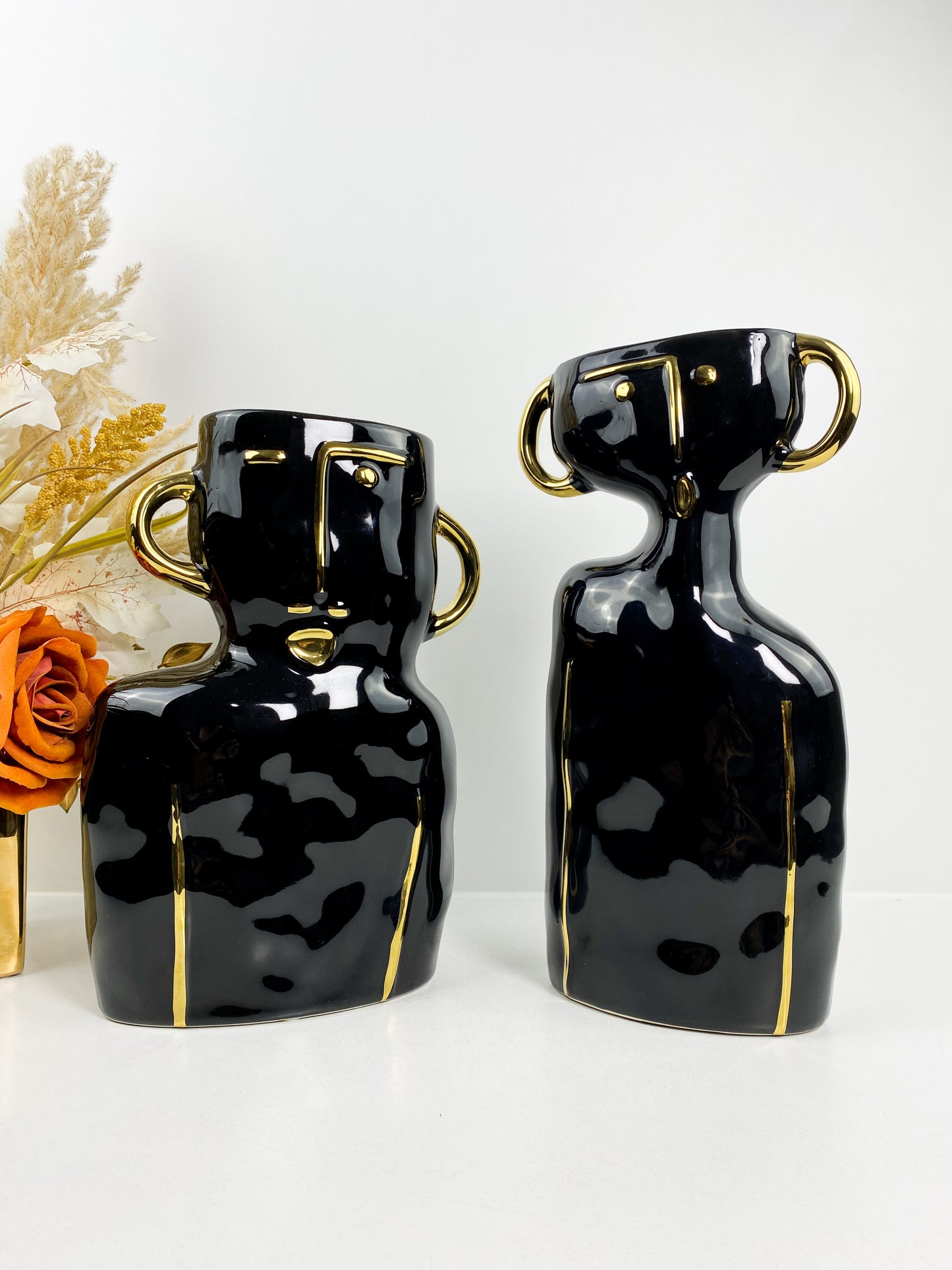 Duo vase noir visage détailles dorée